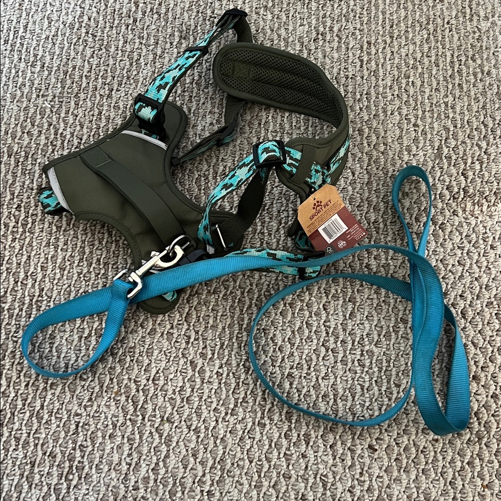 Sport Pet dog harness in an olive/camo color scheme. With blue leash.